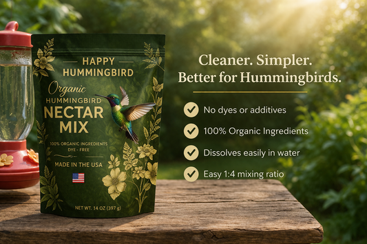 Happy Hummingbird Organic Nectar Mix packaging on a wooden surface with a natural background